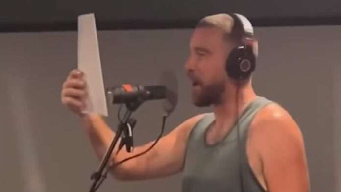 Travis Kelce's Christmas era: Footage emerges of Taylor Swift's boyfriend in the studio recording festive song 'Fairytale of Philadelphia' as fans call on couple to release a duet
