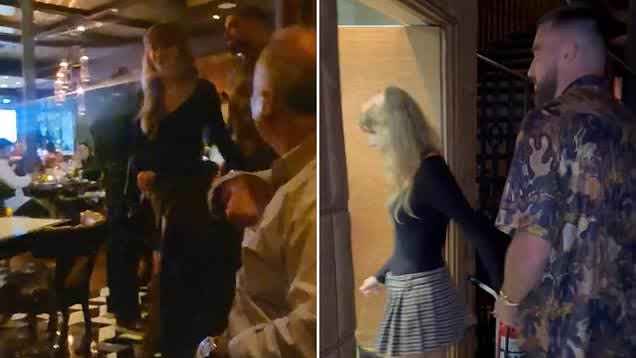 Taylor Swift introduces boyfriend Travis Kelce to her father Scott during luxury steak dinner in Buenos Aires where staff form guard of honor as couple walk past lovingly holding hands and diners cheer