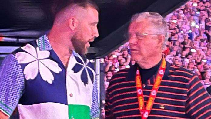 Travis Kelce Reveals he has lured Taylor Swift's dad 'to the Good Side' After the Eagles Fan Was Controversially Seen Wearing a Chiefs Lanyard While Speaking with Him in Buenos Aires