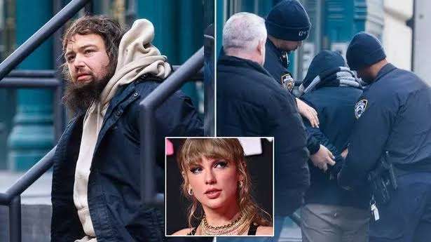 News flash: Taylor Swift's stalker was apprehended and brought away in handcuffs outside the singer's New York City apartment.