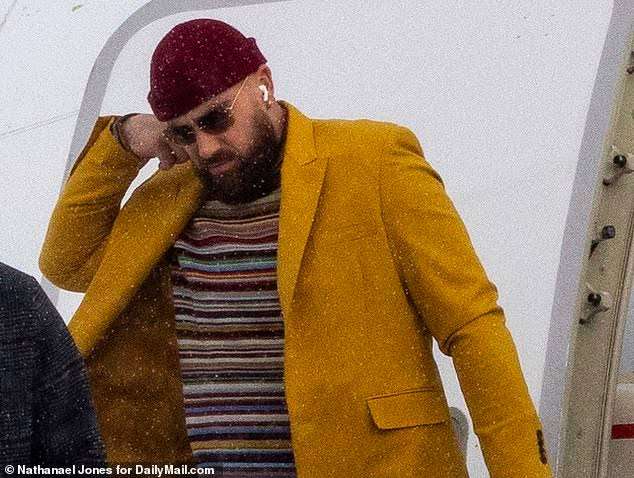 Exclusive: Travis Kelce and the Chiefs arrived in snowy Buffalo for Sunday's HUGE NFL showdown vs. the Bills, with his girlfriend Taylor Swift set to cheer from the stands after'stalker' 'was' arrested outside her Manhattan apartment.