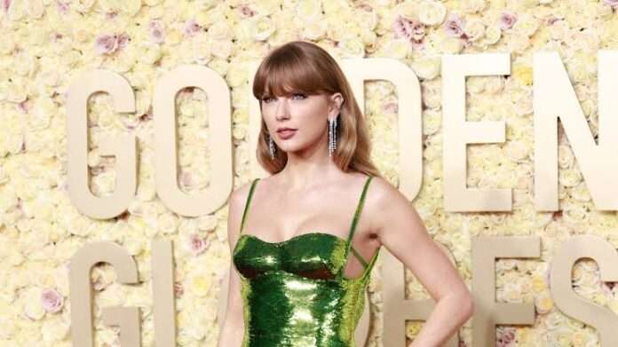 EXCLUSIVE : Despite only being nominated for one thing, Taylor Swift still stole the show with her Gucci dress at the Golden Globes 2024 that sparks frenzy