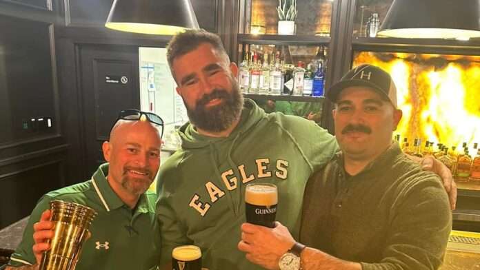 Jason Kelce sinks Guinness and poses with 'adoring' fans while wife Kylie Irish dances at Irish bar in Pennsylvania