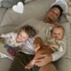 Patrick Mahomes Cuddles Kids Sterling and Bronze on the Couch in Adorable Home Photo